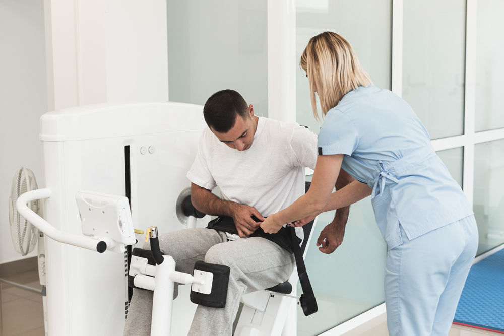 doctor-helping-patient-use-medical-device